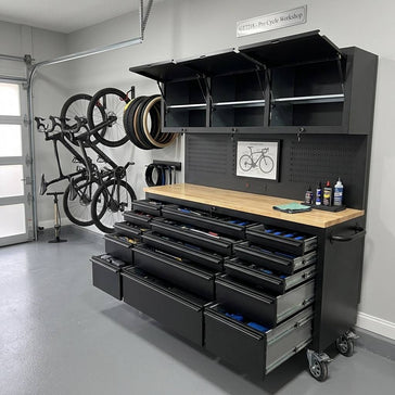 modern garage with durable rolling tool chests and organized workspace, cool lighting