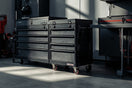 heavy-duty rolling tool chest and modular workstation in a clean modern garage