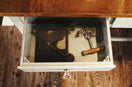 opened white wooden drawer