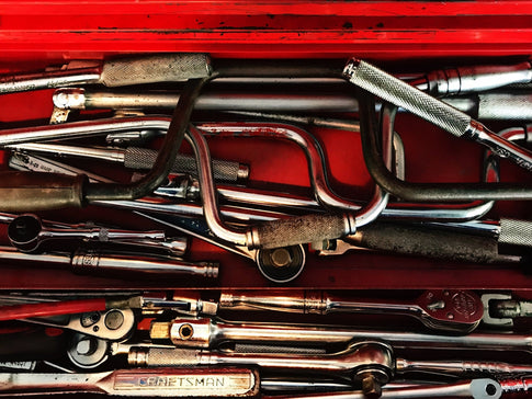 assorted-color hand tools