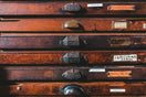 brown wooden drawer with silver door knob
