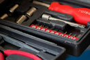 red and black hand tool