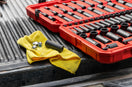 yellow textile on red and black plastic crate