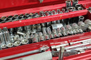 a red toolbox filled with lots of tools