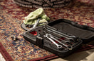 a bunch of tools sitting on top of a rug