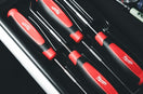 a set of red and black kitchen knives in a case