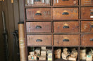 An old wooden cabinet filled with tools