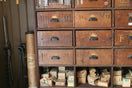 An old wooden cabinet filled with tools
